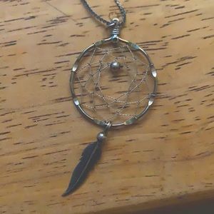 Beautiful charm necklace. Dream away with this 24 k plated piece